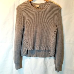 A. Moss short front sweater long sleeves